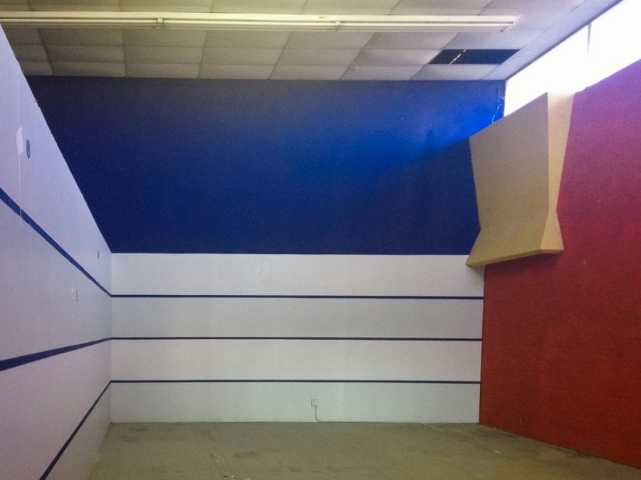 Interesting blue and red textured walls