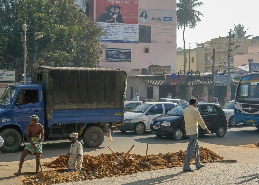 Roadside construction zone with no signage in Bengaluru, India