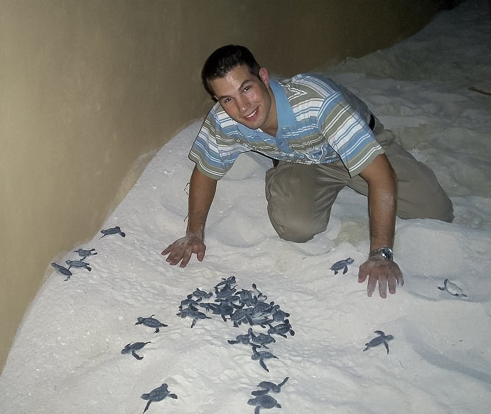 Me helping release a bunch of baby turtles