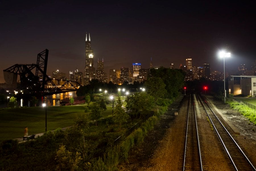 The skyline and railroad at night