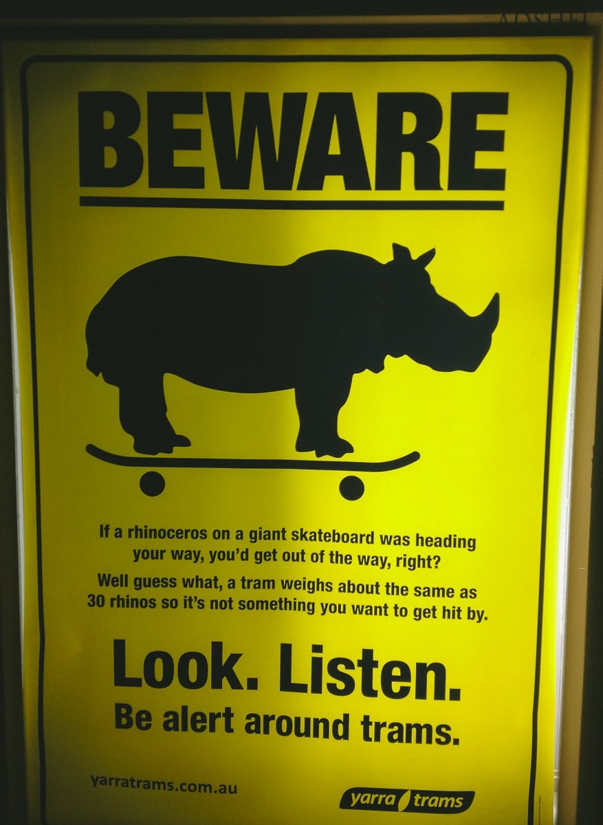 Yarra Trams Safety Poster, Rhino On a Skateboard. Look. Listen.