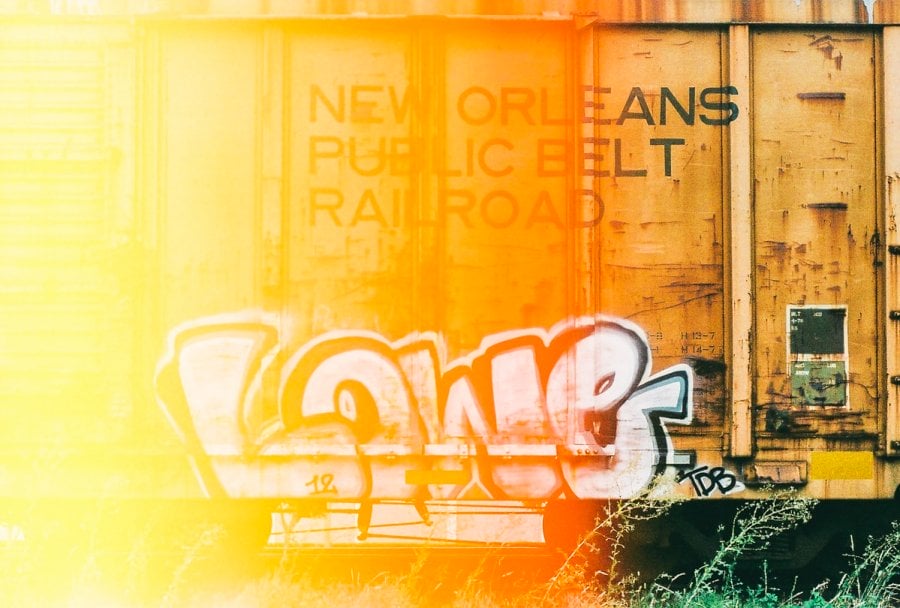 Light leak in a photo of graffiti on an abandoned boxcar