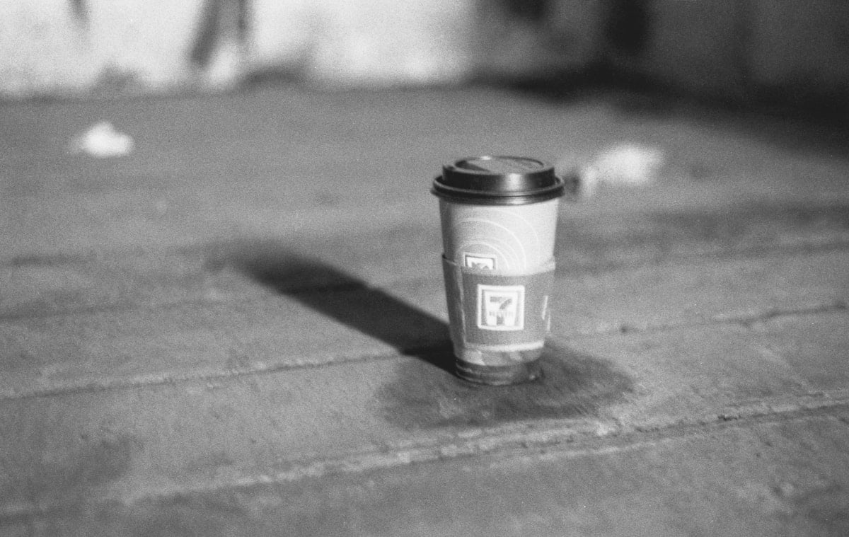A 7-11 Coffee cup in an abandoned boxcars