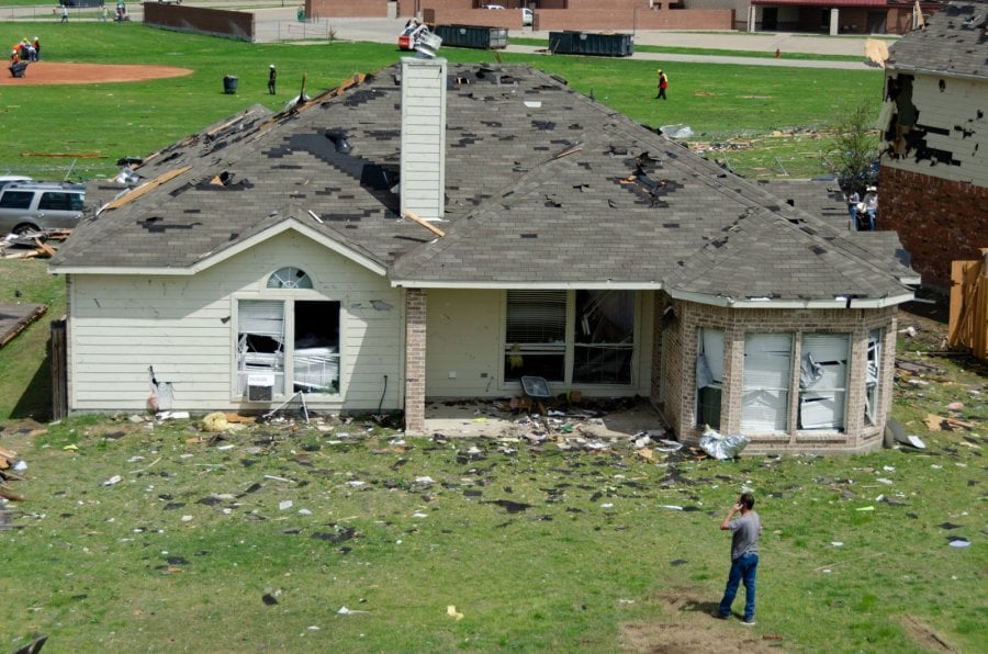 A damaged house in the Diamond Creek subdivision