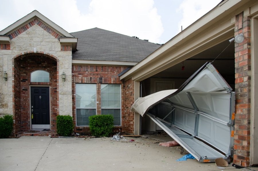 A garage door destroyed by the tornado