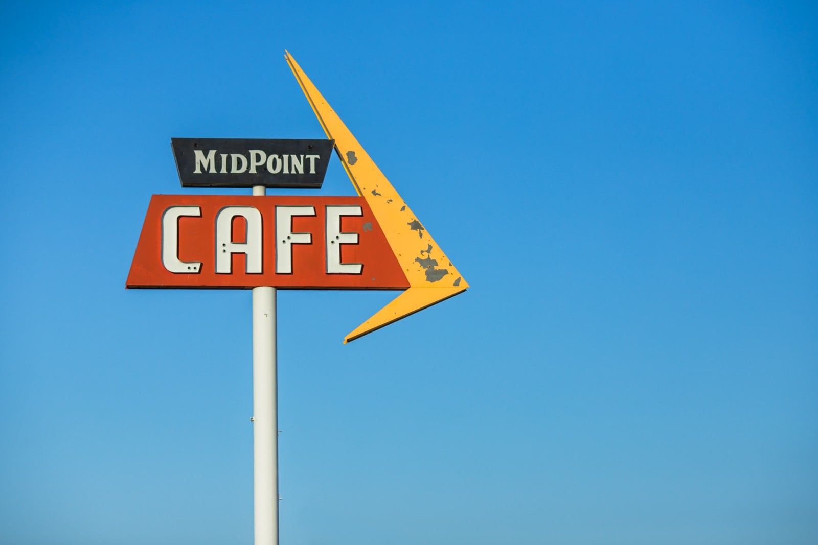Midpoint Cafe vintage road sign
