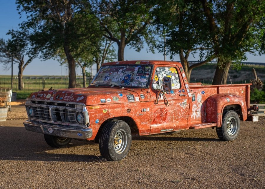 A ford truck with stickers and writing all over it in Adrian, Texas