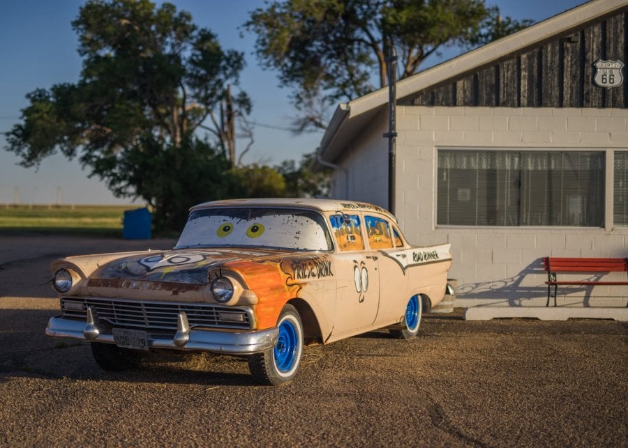 An antique car painted like a character from the Pixar movie Cars at the Route 66 Midpoint
