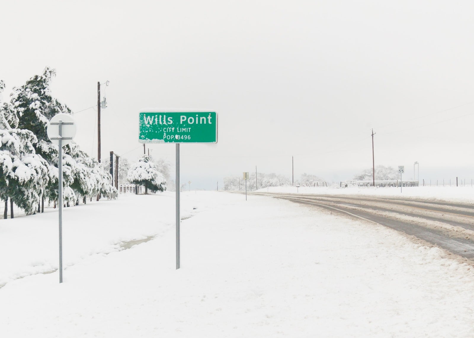 Wills Point city limit sign with snow on it