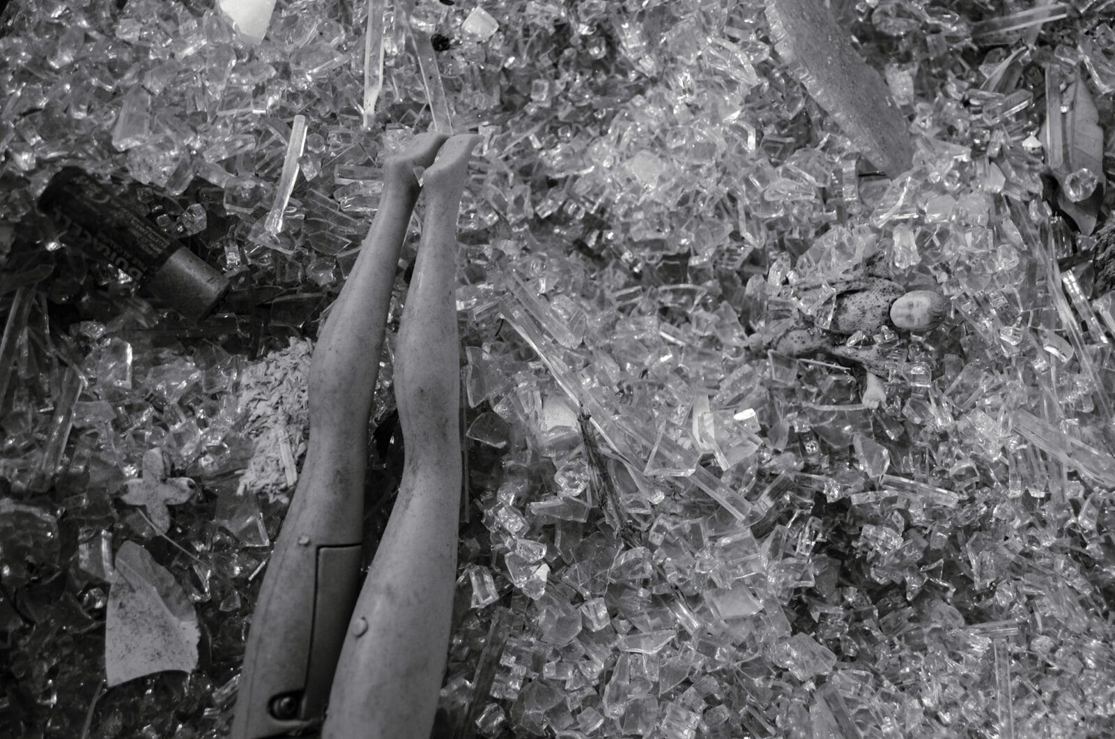 Toys in a broken glass 