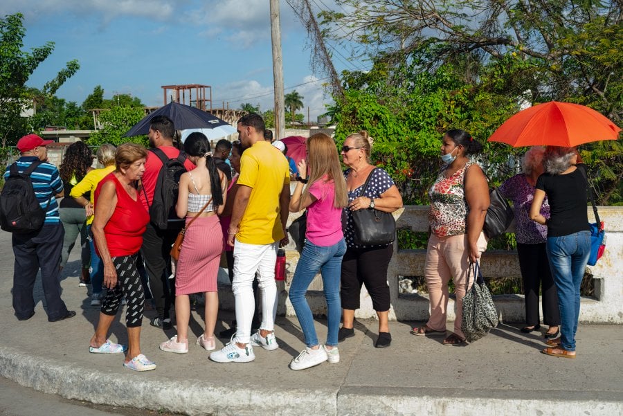 People waiting in line in Havana, Cuba