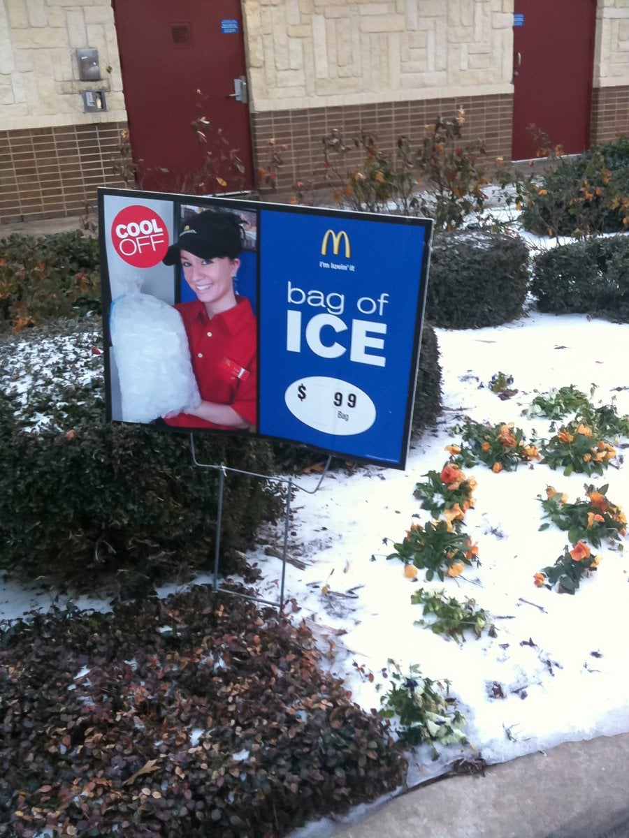 McDonald's sign buy a bag of ice in the snow