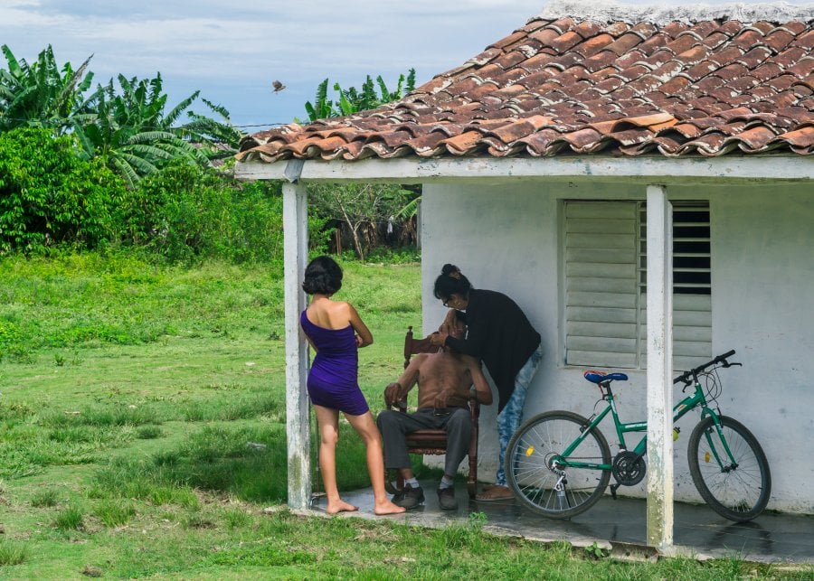Man getting a morning shave in Antonio De Las Vueltas, Cuba