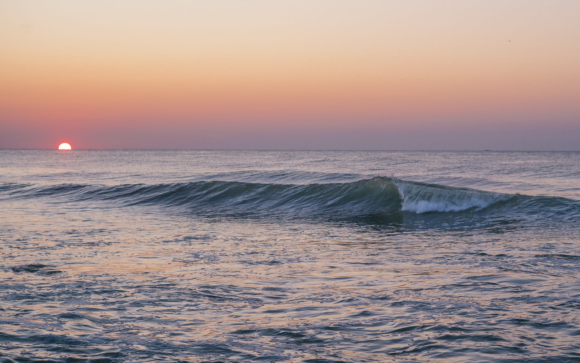 Ocean wave at Point Judith, Narragansett, Rhode Island during sunrise